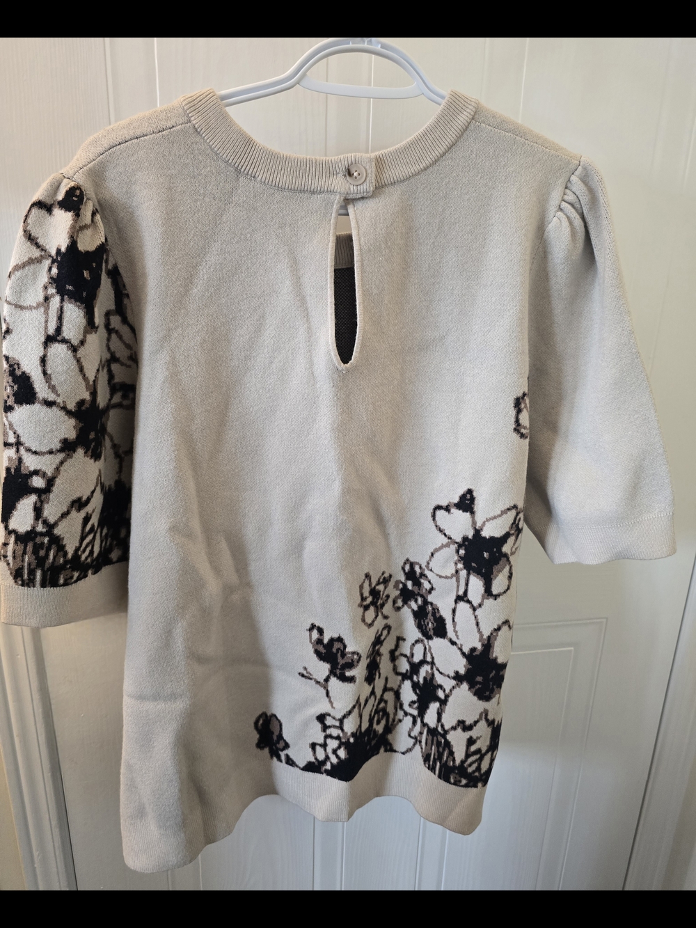 Ricki's Beige Knit Top with Black Floral Accent - Picture 3 of 3